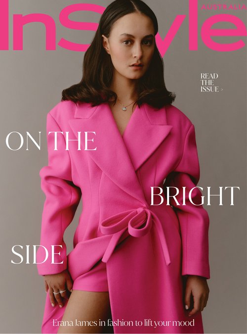 Portrait of a brunette woman in a bright pink trench coat on a magazine cover, featuring text such as 'Instyle' and 'On the Bright Side'.
