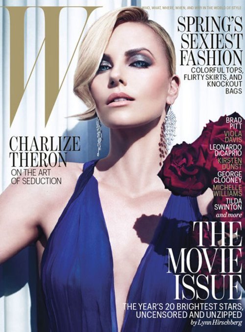 Charlize Theron on W Magazine cover. Close-up of woman with blonde hair and blue dress in a portrait shot for magazine cover.