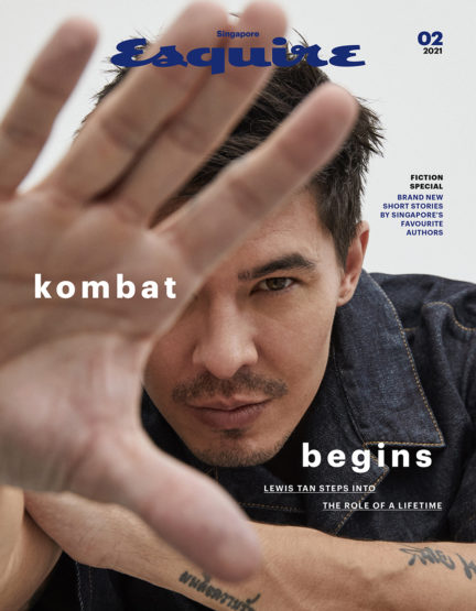 Esquire Singapore cover featuring Lewis Tan, partially obscured by a hand, wearing a denim jacket, with magazine text and logos.