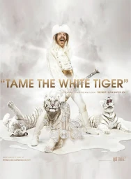 A man in white costume and furry hat holds a guitar alongside three white tigers in a snowy landscape for Zachary Scott