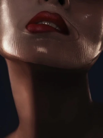 Close-up of lower face with glossy red lips biting lower lip, covered in a sheer gold patterned veil, by make-up artist Rae Morris.