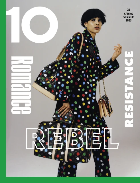 Magazine cover featuring model in polka dot suit with handbags, title '10 Romance Resistance Rebel', spring/summer 2023 edition.