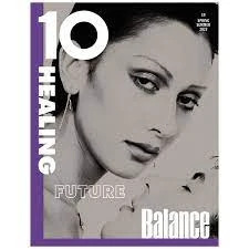 Magazine cover featuring a close-up of an adult woman with neutral facial expression, surrounded by text, with a violet border.