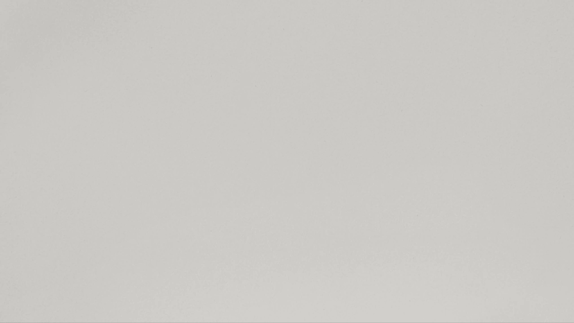 Seamless light gray background, conveying subtle texture and clean aesthetic for various design applications and creative projects.