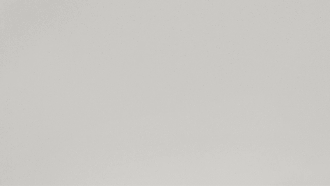 Seamless light gray background, conveying subtle texture and clean aesthetic for various design applications and creative projects.