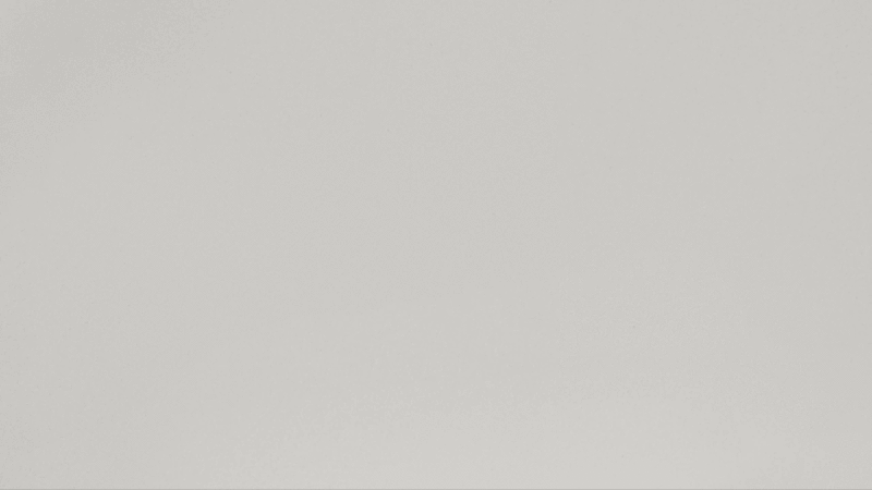 Seamless light gray background, conveying subtle texture and clean aesthetic for various design applications and creative projects.