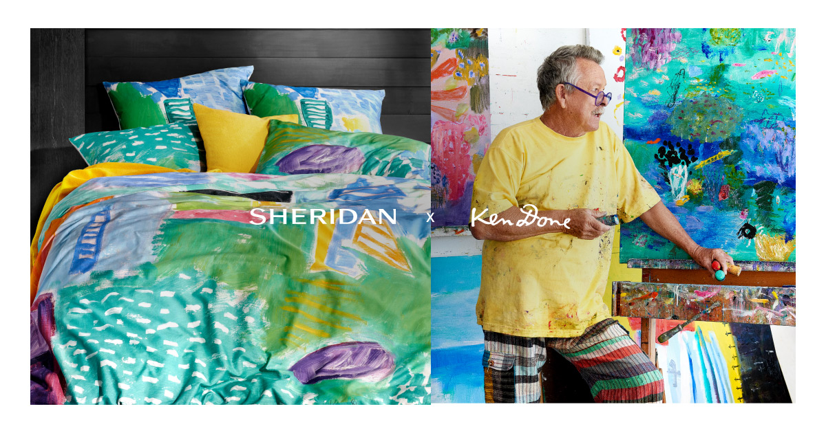 Bedding with abstract pattern next to artist Ken Done with his vibrant painting. Fashion and interior design merge in a creative scene.