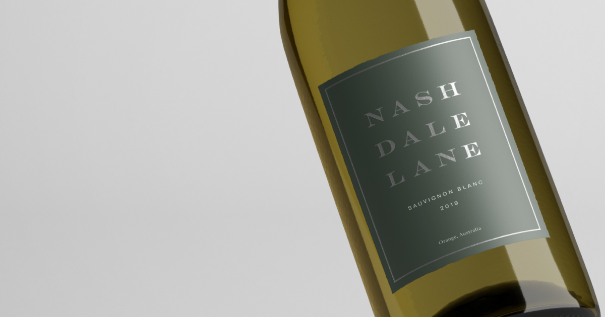 A single bottle of Nashdale Lane Sauvignon Blanc wine sits against a neutral background, highlighting the bottle's elegant label.