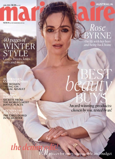 Marie Claire Australia magazine cover featuring Rose Byrne with white dress and statement sleeves against a neutral outdoor backdrop.