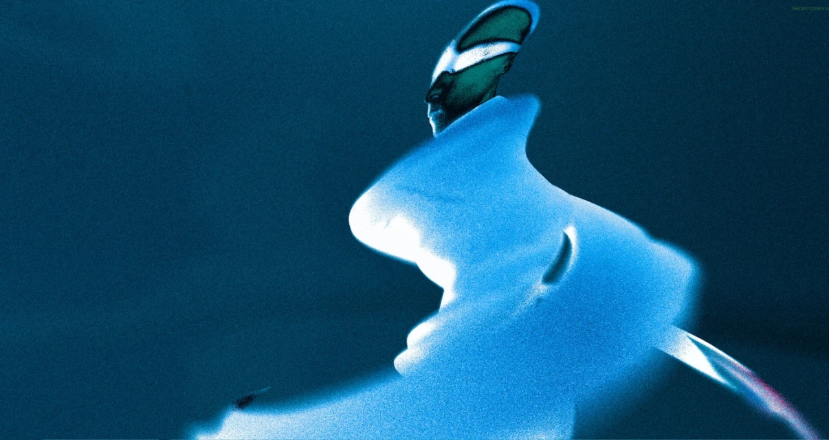 Abstract depiction of a person with bright blue and white tones against a dark background in a creative art piece.