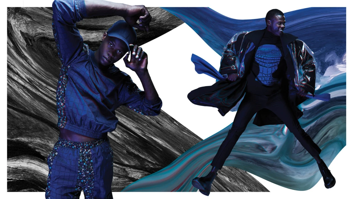 Fashion editorial shot featuring two Black male models in patterned, blue outfits against a dynamic, abstract background with a moody tone.