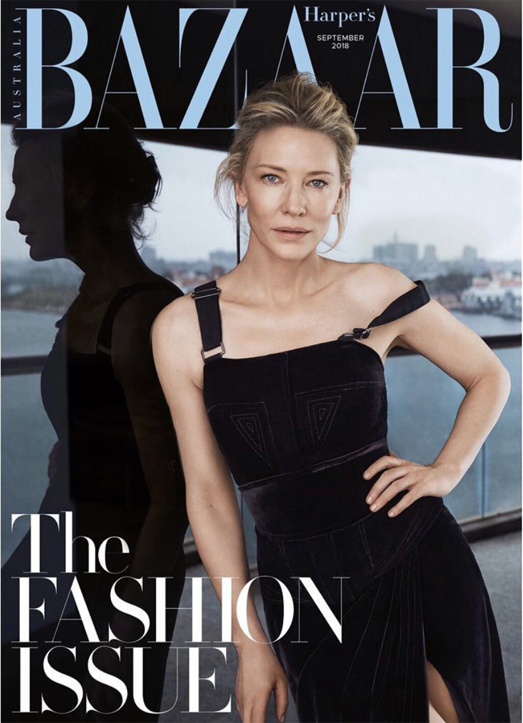 Cate Blanchett on Harper's Bazaar Australia September 2018 cover, wearing an elegant black dress, with reflective city background.