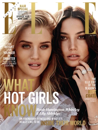 Elle Australia magazine cover featuring models Rosie Huntington-Whiteley and Lily Aldridge, close-up studio shot with golden text overlay.