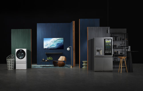 Modern interior set with washing machine, smart refrigerator, and television against a dark background, creating a contemporary living space.