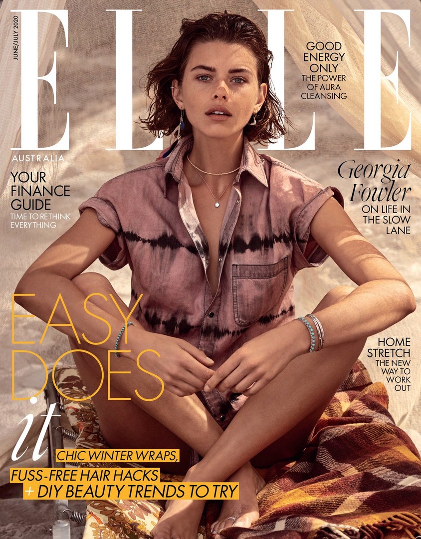 Elle Australia magazine cover featuring model Georgia Fowler, wearing a pink tie-dye shirt, shot in a natural outdoor setting with soft lighting.