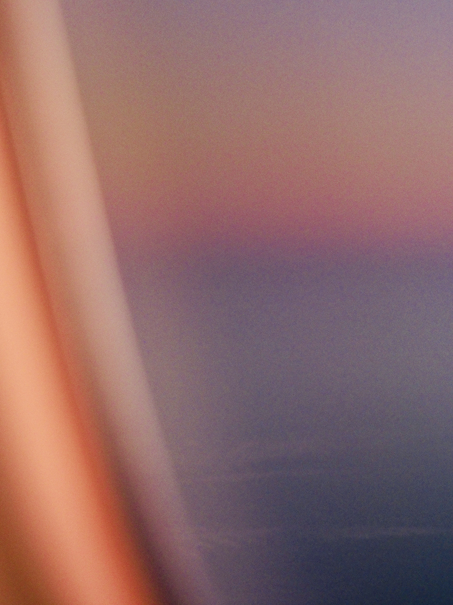 Abstract backdrop featuring a peach column shape against a muted gradient of purple, blue, and pink hues with a blurred effect.