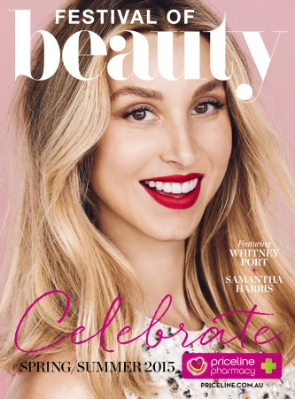 Magazine cover featuring a smiling woman with blonde hair and red lipstick against a pink background with the text 'Festival of Beauty'.