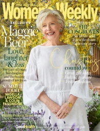 Magazine cover featuring Maggie Beer smiling in a white blouse outdoors among lavender flowers, styled by Mattie Cronan