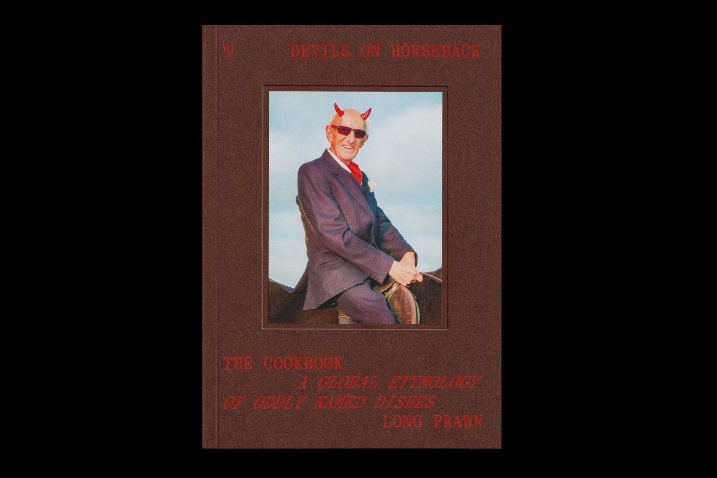 Cookbook cover features an older adult male with devil horns riding a horse against a sky, styled with a brown border.
