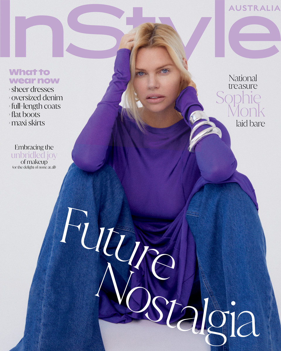 Magazine cover of InStyle Australia featuring Sophie Monk in a purple top and blue jeans, with white text overlays. Fashion, beauty, and editorial content.