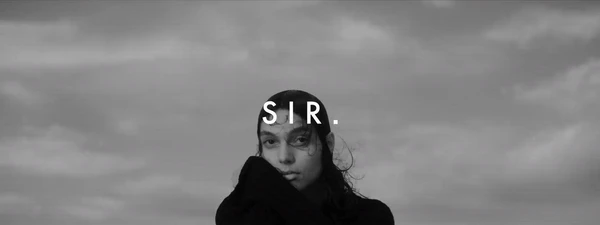 Black and white portrait of a woman against a cloudy sky with overlaid text reading SIR