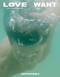 Jordan Barrett submerged underwater in a turquoise pool with floating air bubbles, styled by Jessica Dos Remedios.