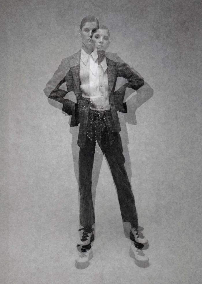 Multiple exposure fashion portrait of a model in a patterned suit by David Mandelberg