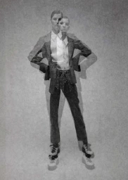 Multiple exposure fashion portrait of a model in a patterned suit by David Mandelberg