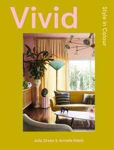 Interior design magazine cover featuring a living room with yellow sofa, patterned pillows, and a variety of plants and decor.