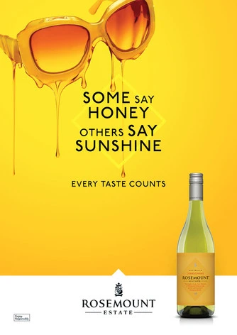 Rosemount Estate wine bottle and honey-dripping sunglasses on a yellow background with the brand logo and wine name.