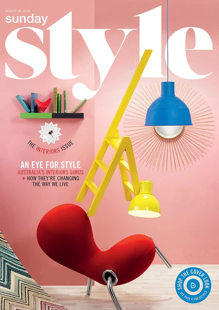 Sunday Style magazine cover featuring a red chair, yellow ladder lamp, and blue pendant light in a modern interior design setting.