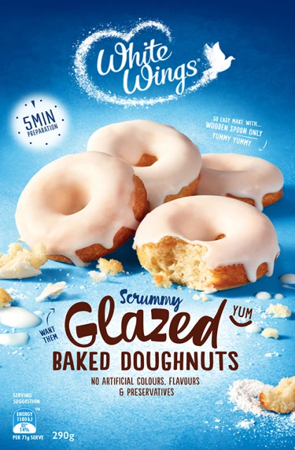 Close-up shot of scrummy glazed baked doughnuts on a blue surface, perfect for food and beverage visuals, showcasing the sweet treat.
