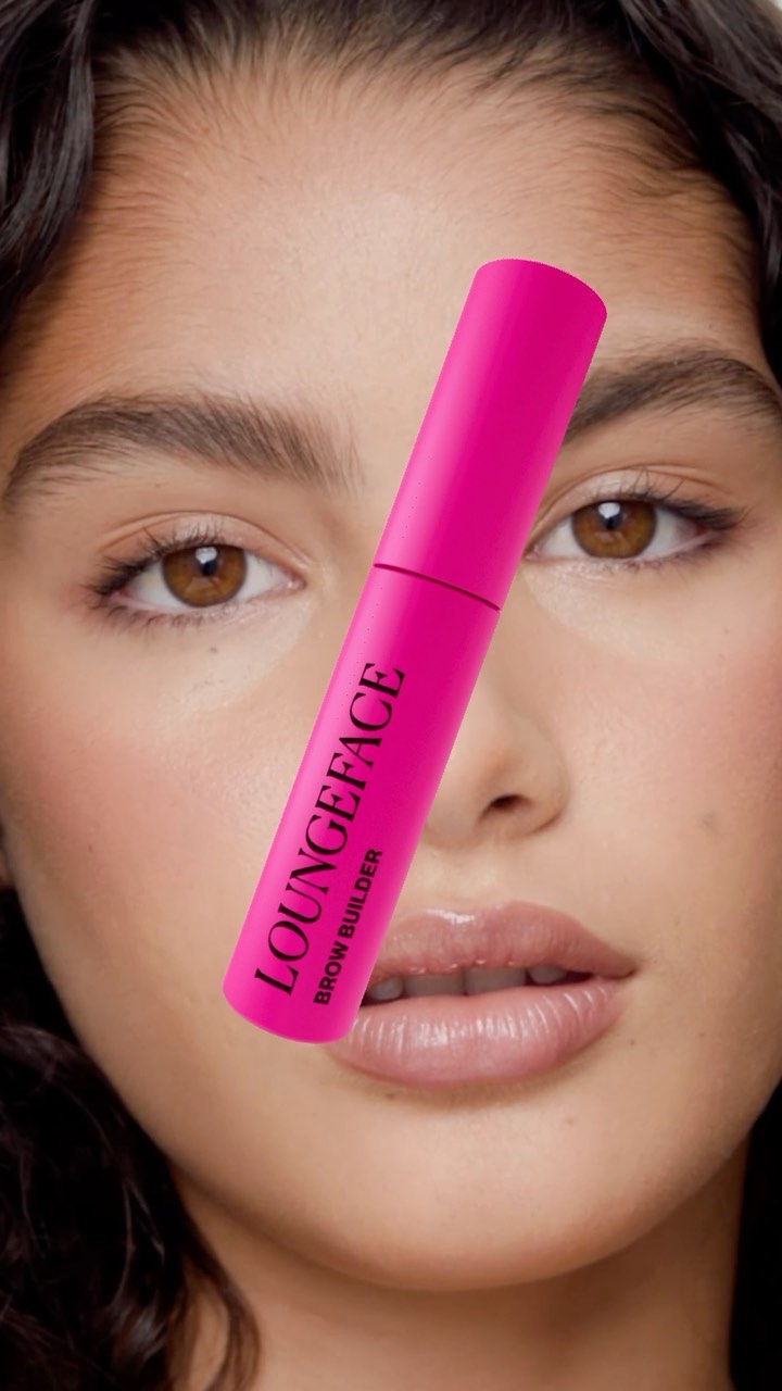 Close-up of a young adult woman with a pink cosmetic product in front of her face, highlighting skincare and beauty.