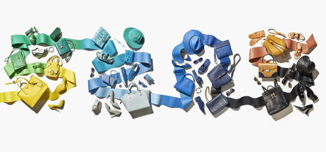 A vibrant array of colorful fashion accessories including handbags, shoes, hats, and sunglasses arranged on a clean white background.