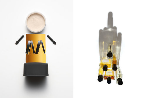 Creative beauty product still life: makeup and fragrance bottles arranged into a playful, artistic composition on a white background.