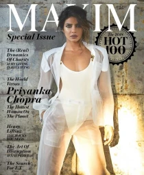 Priyanka Chopra wearing a sheer white blazer and matching trousers in a magazine cover editorial portrait.