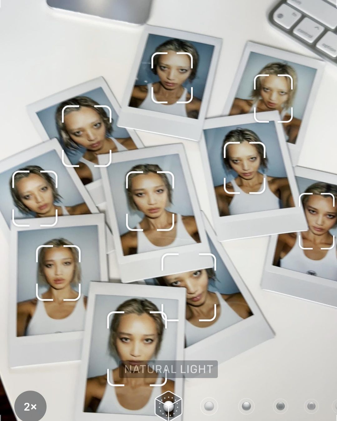 Collection of instant photos featuring a young woman with light brown hair and fair skin, posing in various angles in a brightly lit setting.