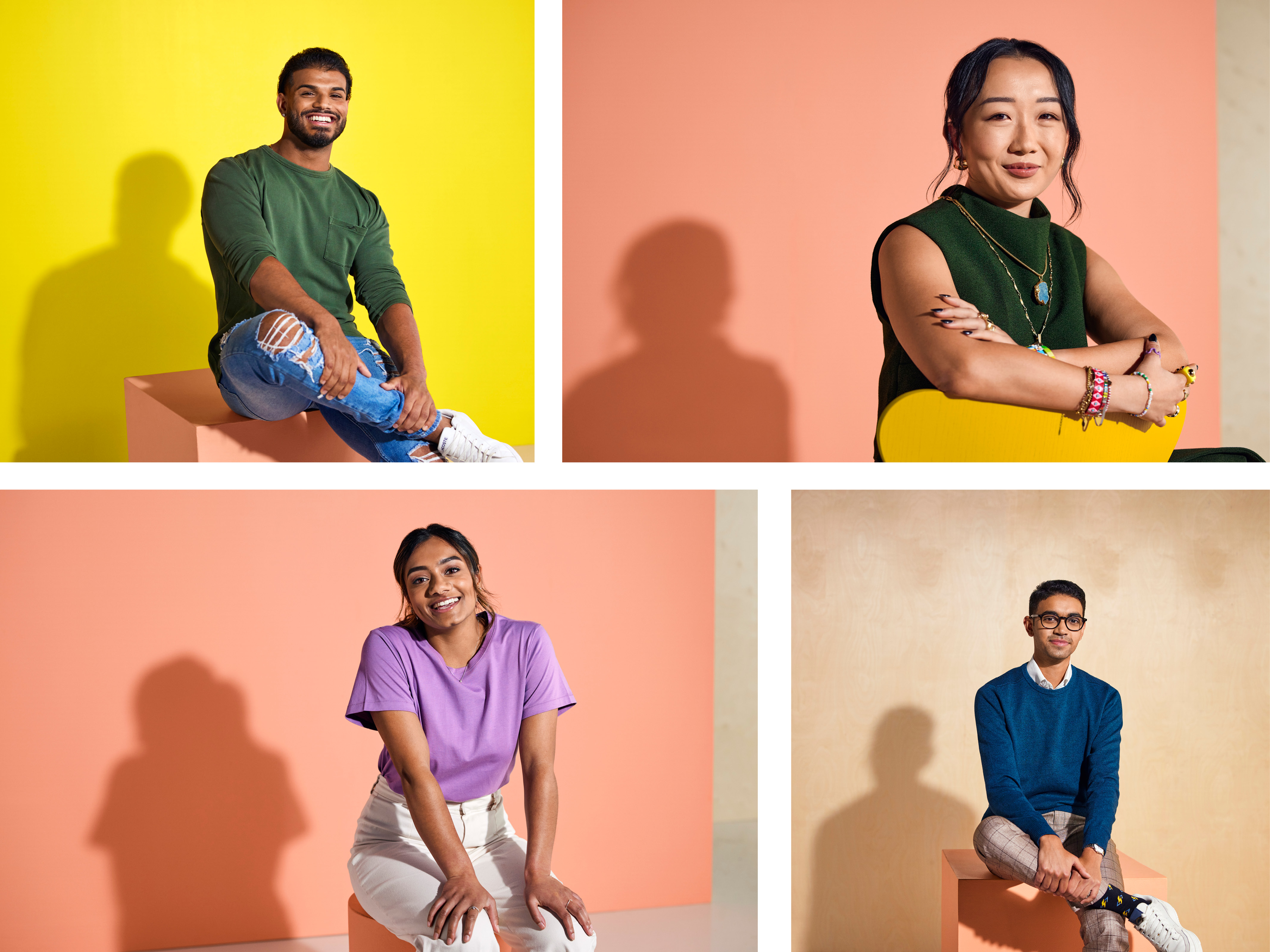 Collage of four smiling young adults sitting on blocks, against colorful studio backdrops, wearing casual clothing in a portrait format.