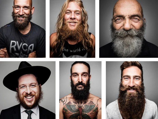 Six portraits of men with beards. A collage of diverse faces, beards, and expressions against a neutral gray backdrop, shot indoors.