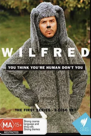 DVD cover art features an adult male in a furry dog costume in an outdoor setting, promoting the 'Wilfred' TV series.