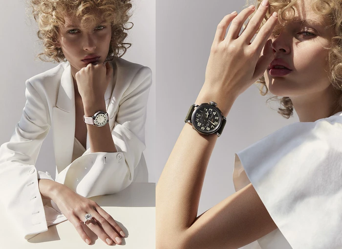 Close-up portrait of a blonde woman wearing a white blazer and luxury wristwatches with make-up by Laure Dansou.