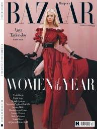 Anya Taylor-Joy wearing a red off-the-shoulder dress seated on a black horse for a magazine cover