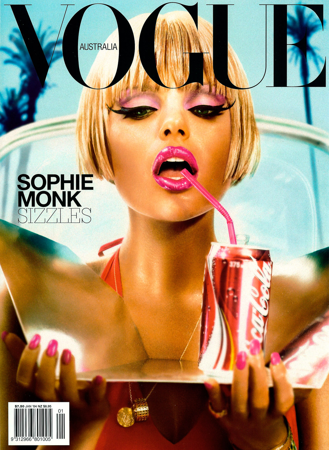 Vogue Australia magazine cover featuring Sophie Monk drinking soda with a straw, pink lipstick, blonde bob, and palm tree background.
