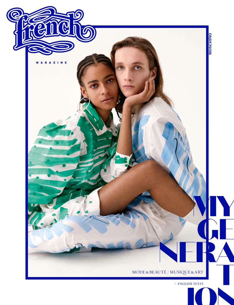 Fashion magazine cover with two models, one with braided hair in a green patterned top and the other with long brown hair in blue.