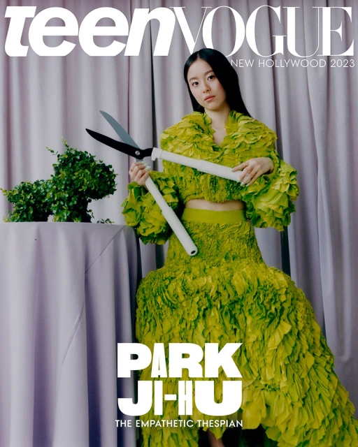 Magazine cover featuring Park Ji-hu in a green ruffled outfit holding pruning shears, with Teen Vogue and New Hollywood 2023 text.