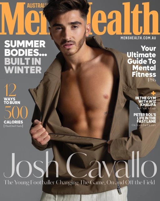 Men's Health magazine cover featuring shirtless Josh Cavallo wearing an open jacket, set against a gray background. Summer bodies, mental fitness.