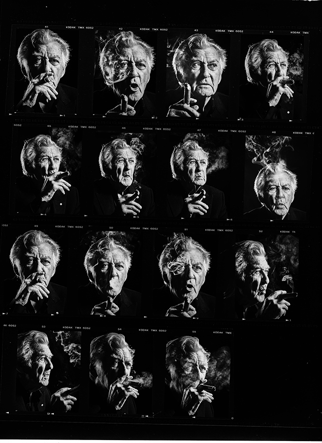 Contact sheet of a man smoking a cigar, shot in black and white. Multiple portraits show a range of facial expressions.