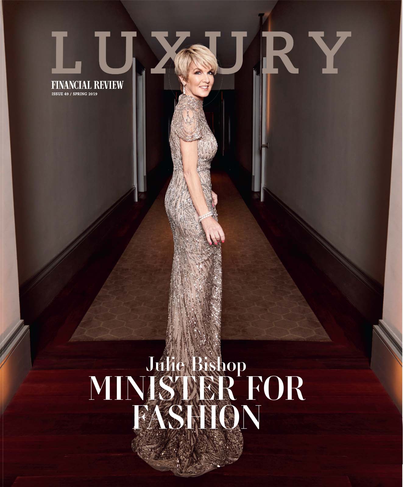 Magazine cover featuring Julie Bishop in shimmering gown, hallway background. 'Luxury Financial Review' text visible at top.