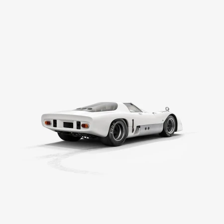 White racing car in a white studio with deep dish wheels, low to the ground and aerodynamic. Automotive photography with copy space.
