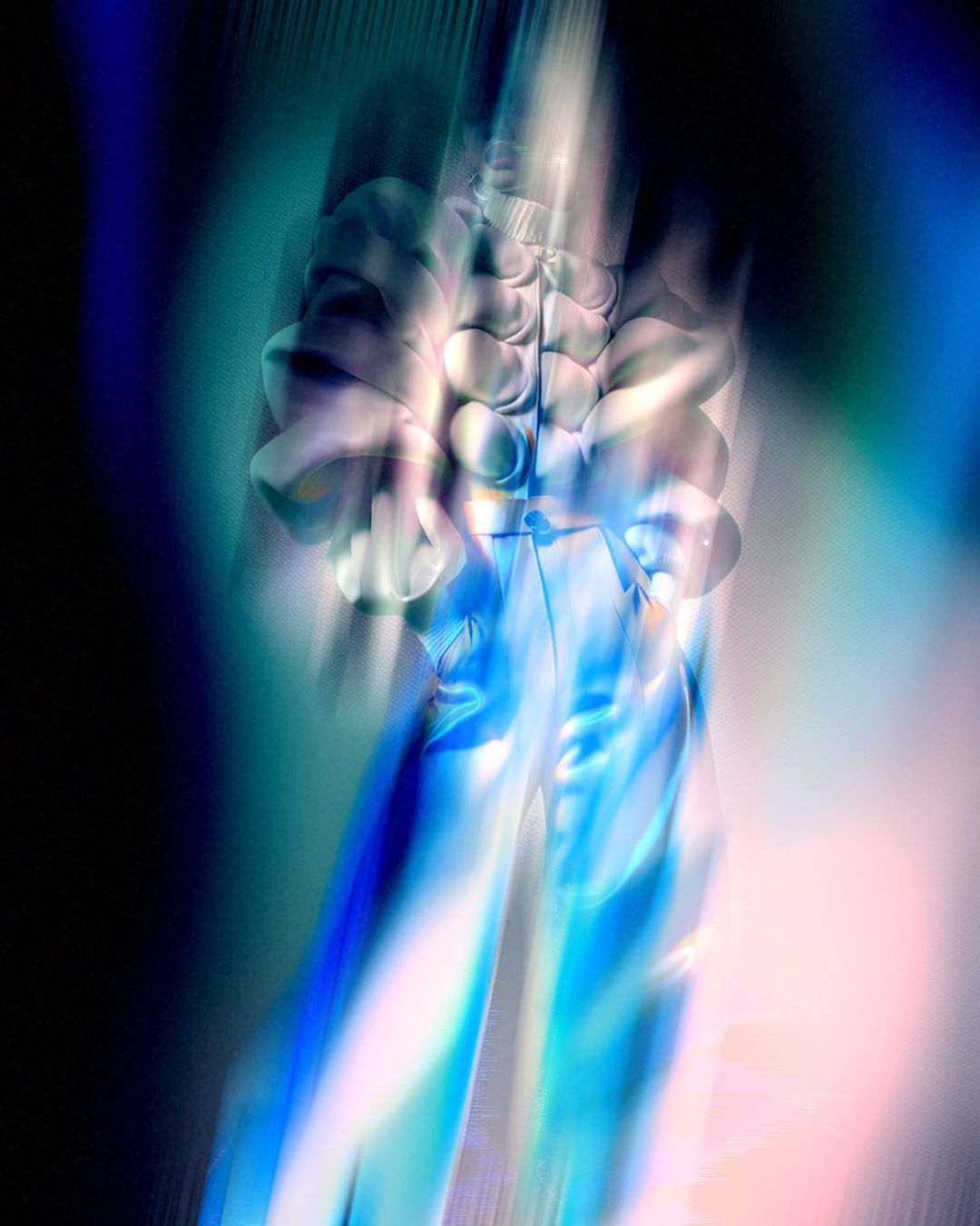 Abstract shimmering lights and shadows in an ethereal color palette of blues, whites, and pinks creating a dreamy, surreal visual.